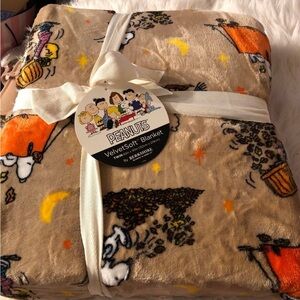 Peanuts Velvetsoft Blanket with Tan and Colorful Accents